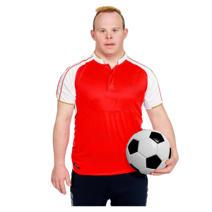 Person in a red soccer jersey holding a soccer ball.