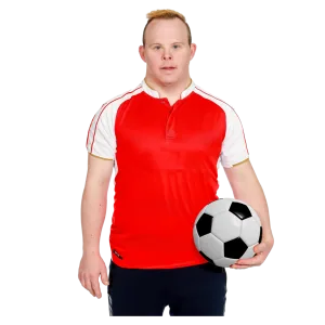 Person in a red soccer jersey holding a soccer ball.