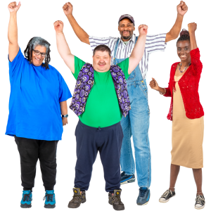 Four people standing together with one arm raised in celebration, smiling and looking happy.