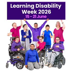 Group celebrating Learning Disability Week 2026 with a purple sign.