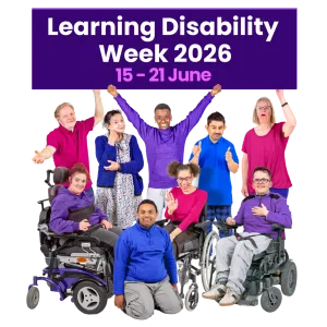 Group celebrating Learning Disability Week 2026 with a purple sign.